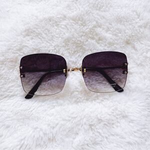 Laurel Clear Black Rimless Sleek Sunglasses